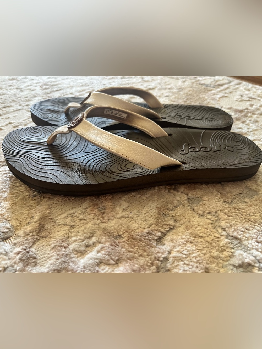 Reef White Strap Flip Flops with Brown Jewel Accent